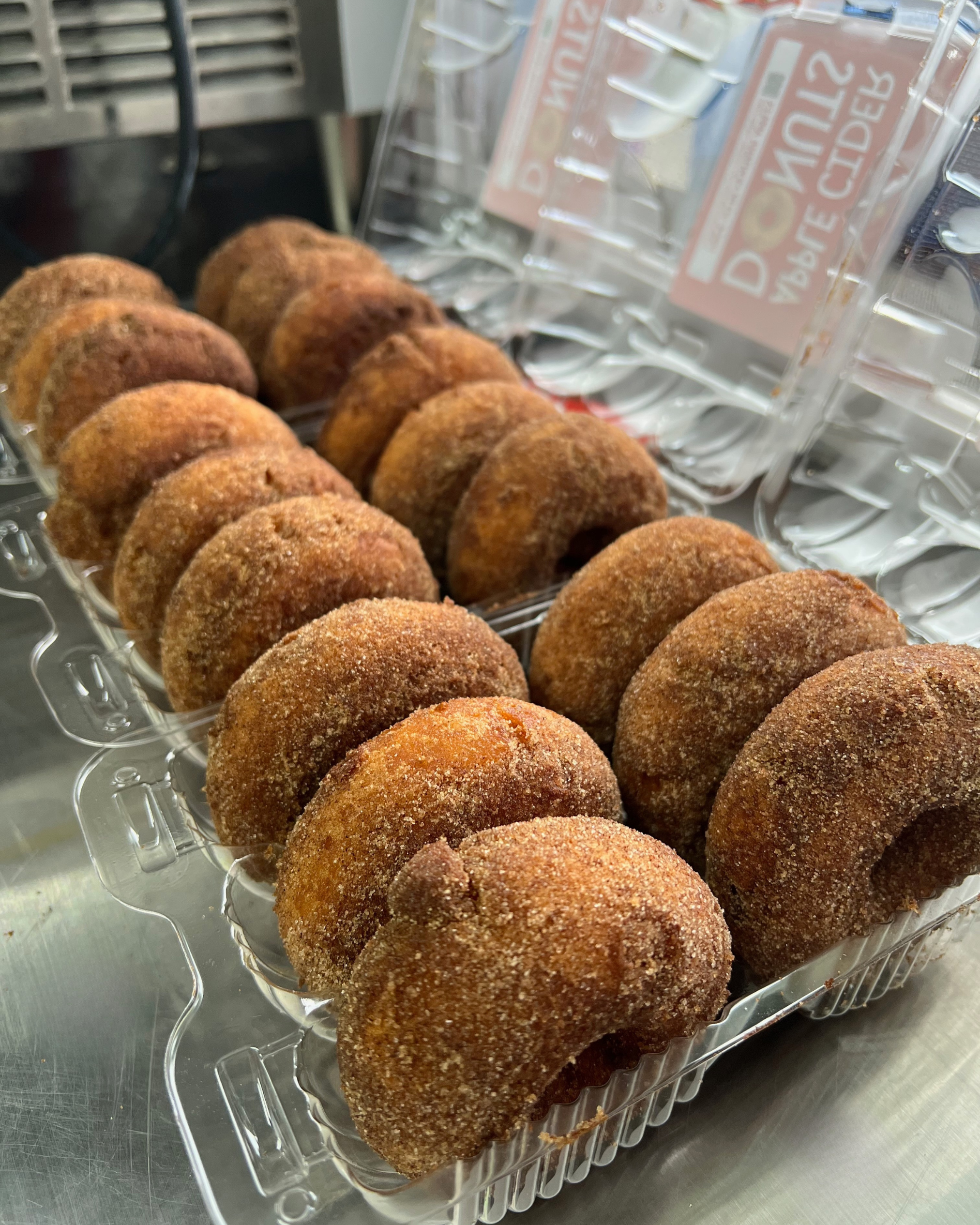 Apple cider donuts in containers